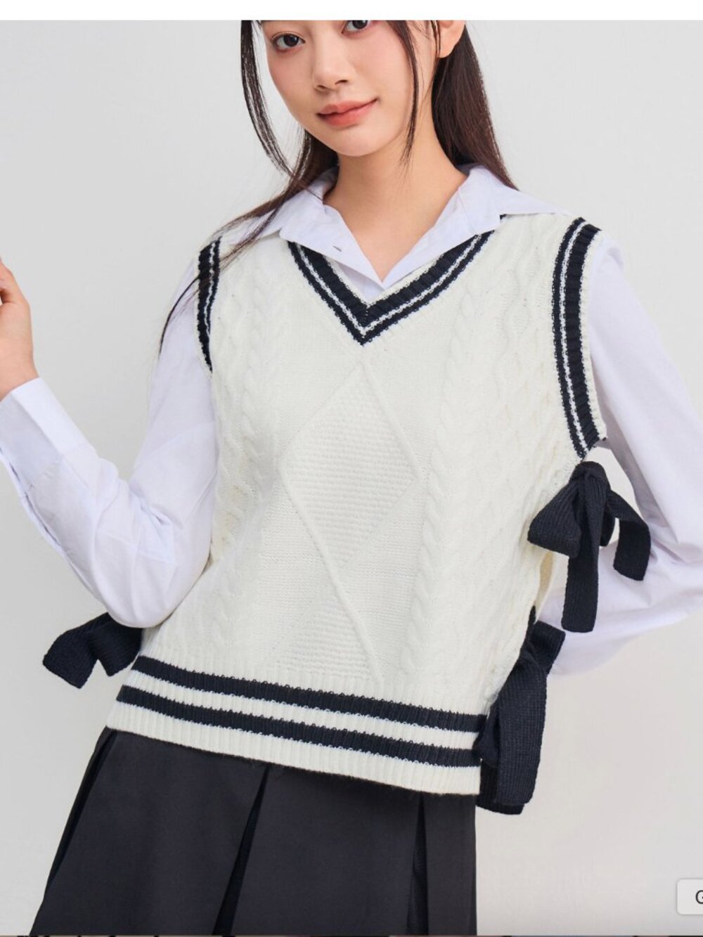 Cider Cream Cable-Knit V-Neck Sweater Vest with Black Trim and Side Bow Knots